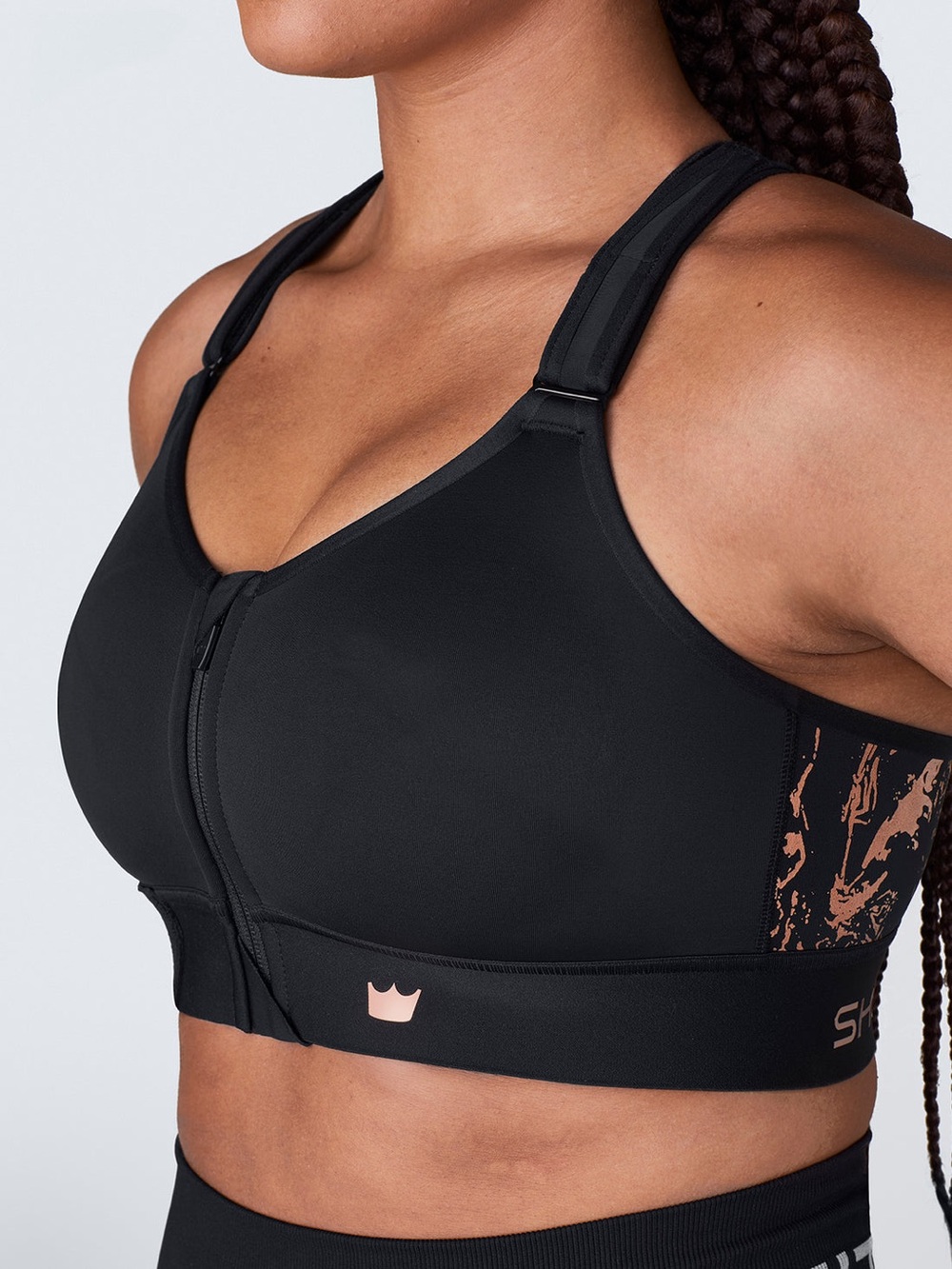 SHEFIT Black Sports Bra with Rose Accent Front-Zip